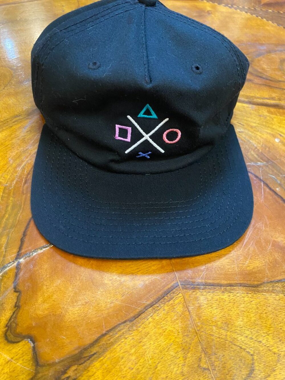 PlayStation controller button icon snapback hat